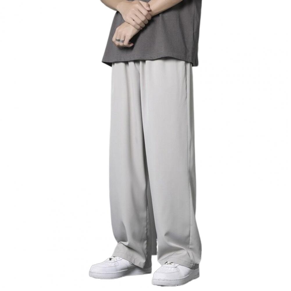 Męskie przewiewne, luźne spodnie dresowe z elastycznym pasem