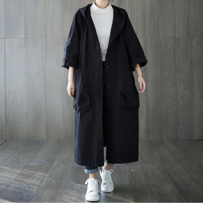 Damski oversize płaszcz z kapturem – stylowy trencz w luźnym kroju