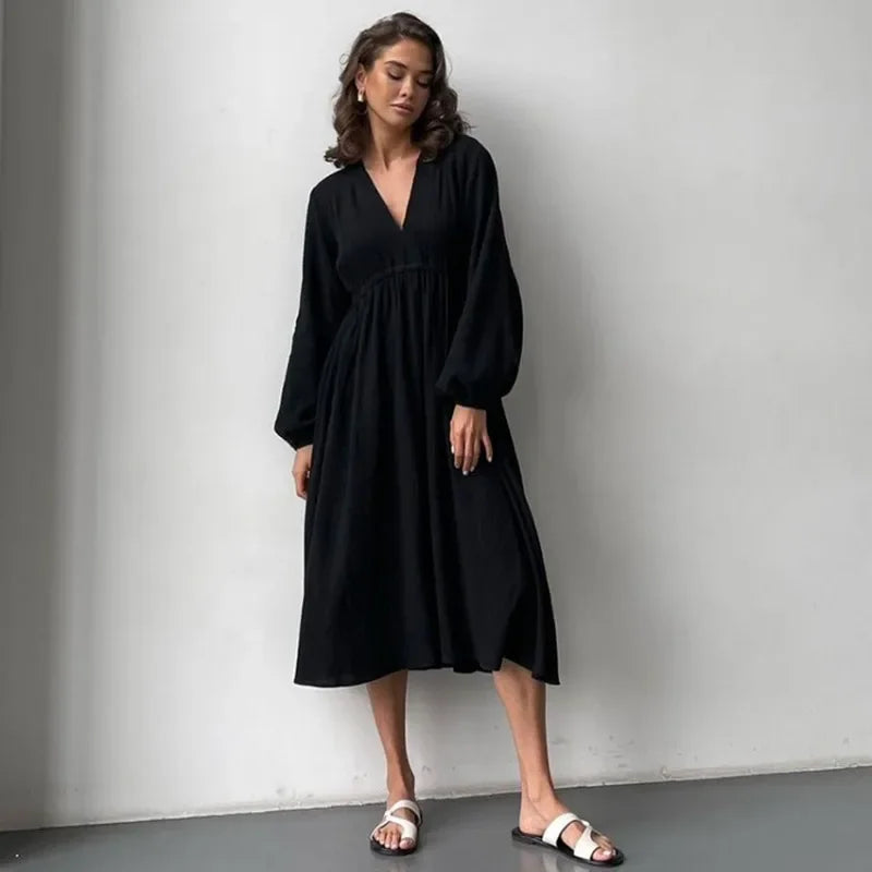 Muślinowa sukienka midi z dekoltem V i długim rękawem – luźna i przewiewna na lato