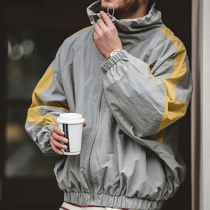 Męska kurtka wiatrówka sportowa – lekka, oddychająca i stylowa