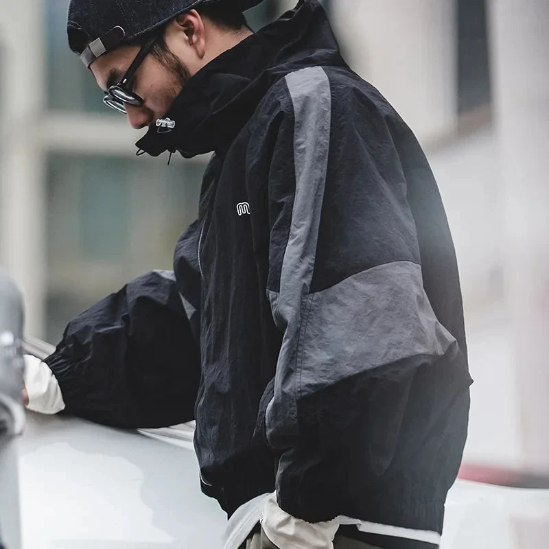 Męska kurtka wiatrówka sportowa – lekka, oddychająca i stylowa