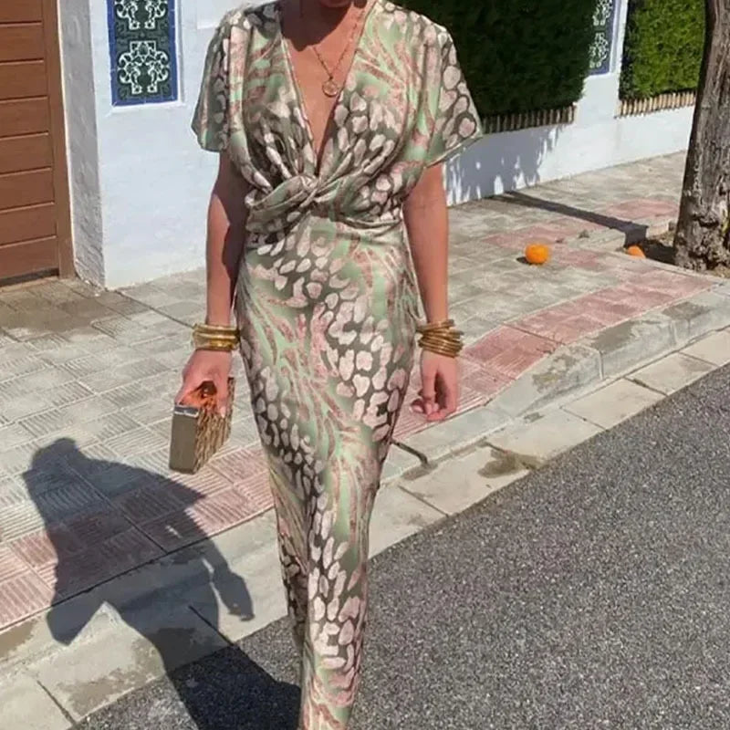 Damska dopasowana sukienka maxi z kopertowym dekoltem i satynowym wykończeniem