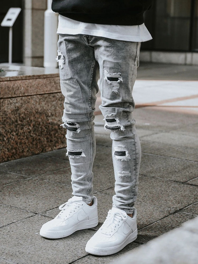 Modne męskie jeansy z przetarciami i dziurami