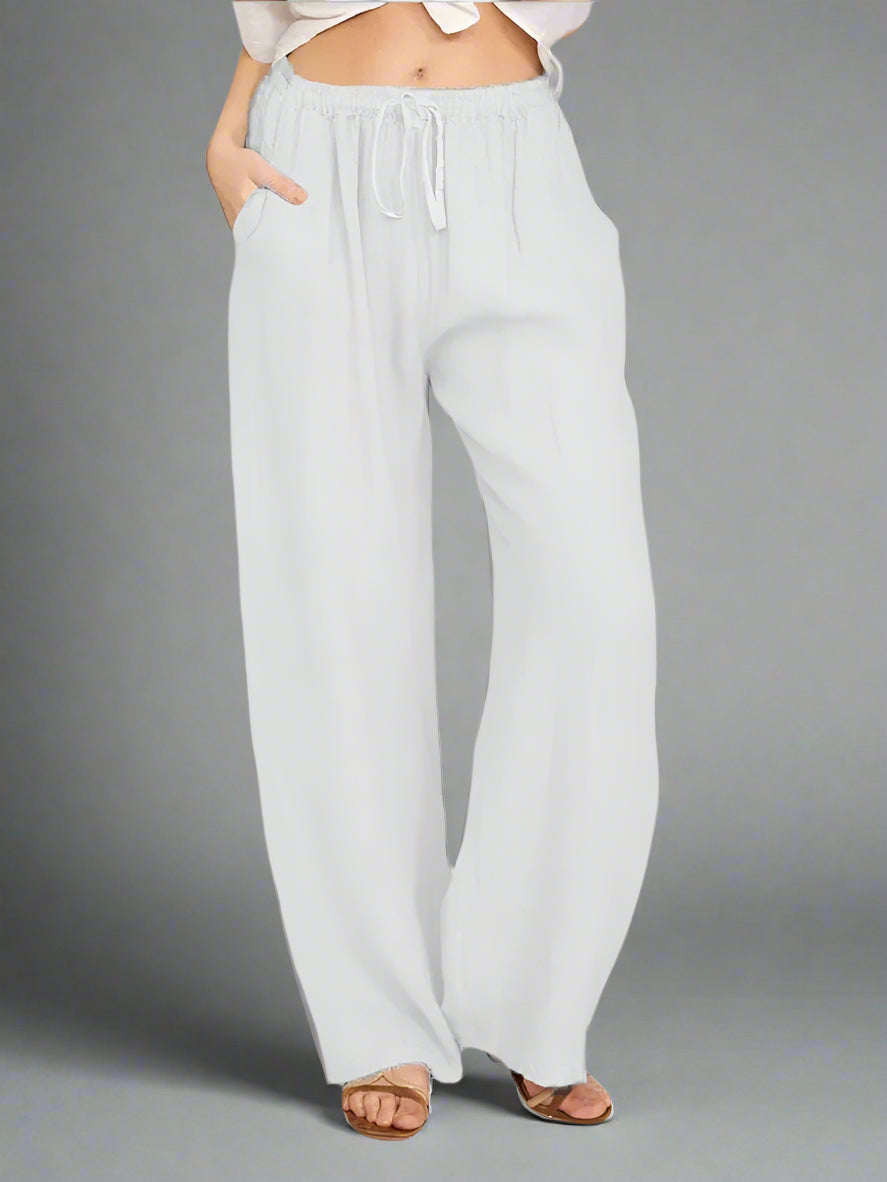 Damskie lniane spodnie z szeroką nogawką – przewiewne spodnie z gumką i troczkiem w pasie
