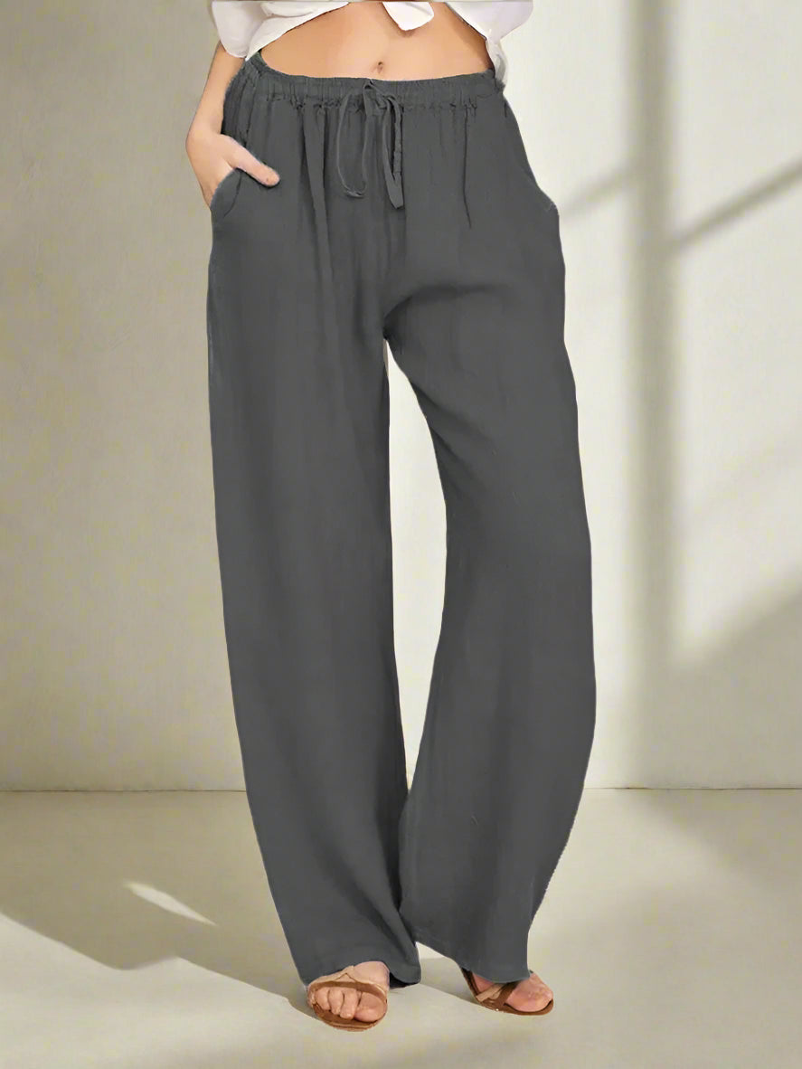 Damskie lniane spodnie z szeroką nogawką – przewiewne spodnie z gumką i troczkiem w pasie
