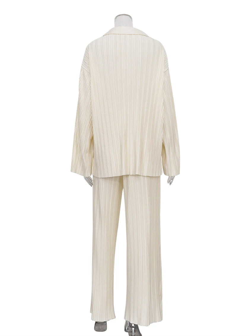 Elegancki damski plisowany komplet: luźna koszula i szerokie spodnie