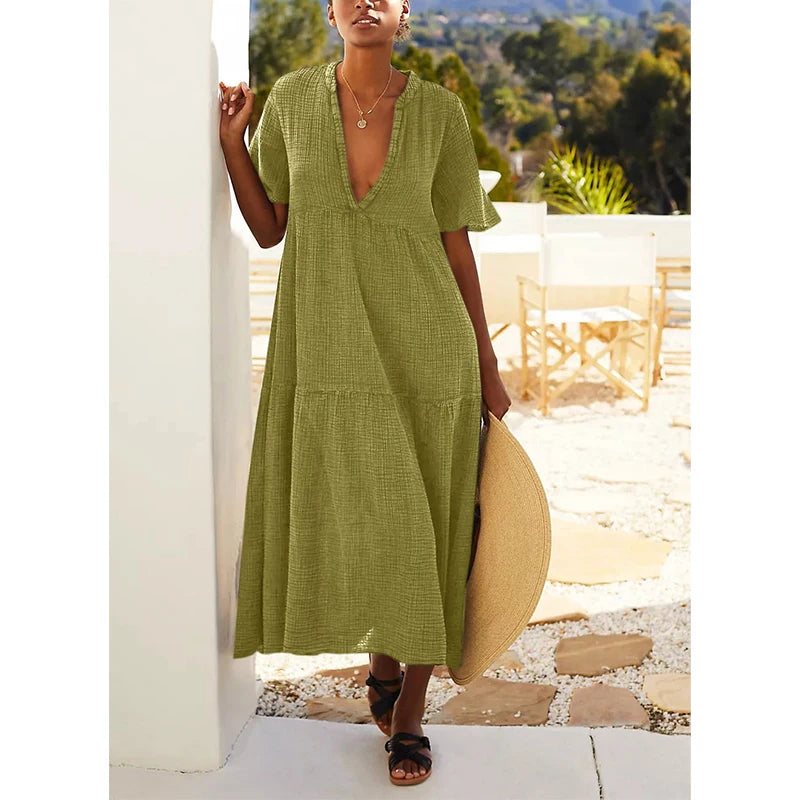 Muślinowa sukienka midi z krótkim rękawem i dekoltem V – lekka sukienka na lato