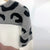 Damski sweter z wzorem w cętki