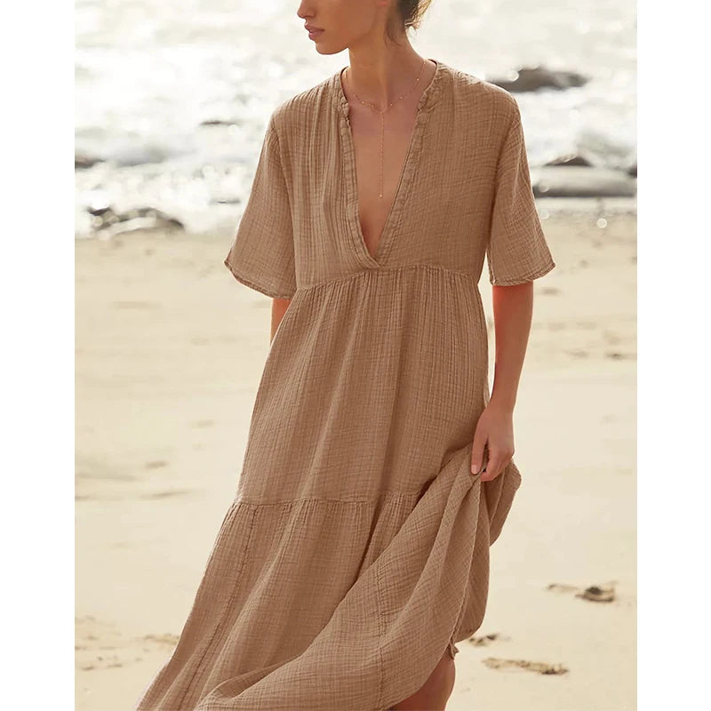 Muślinowa sukienka midi z krótkim rękawem i dekoltem V – lekka sukienka na lato