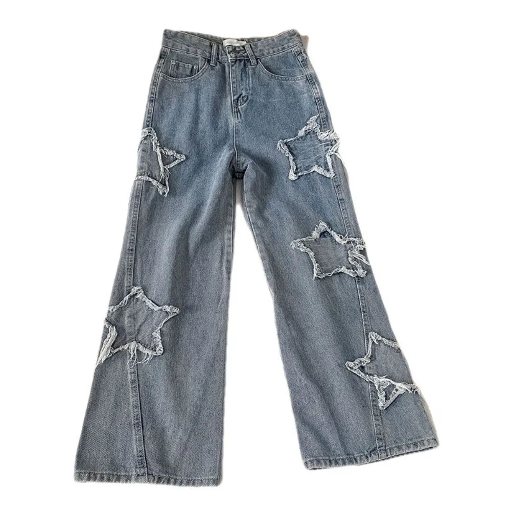 Damskie spodnie jeansowe z naszywkami w gwiazdy