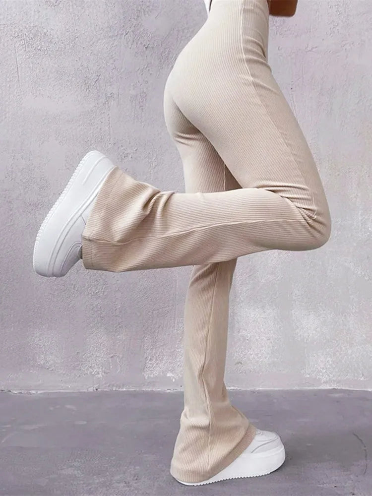 Damskie prążkowane spodnie dzwony z wysokim stanem