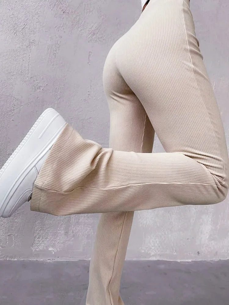 Damskie prążkowane spodnie dzwony z wysokim stanem