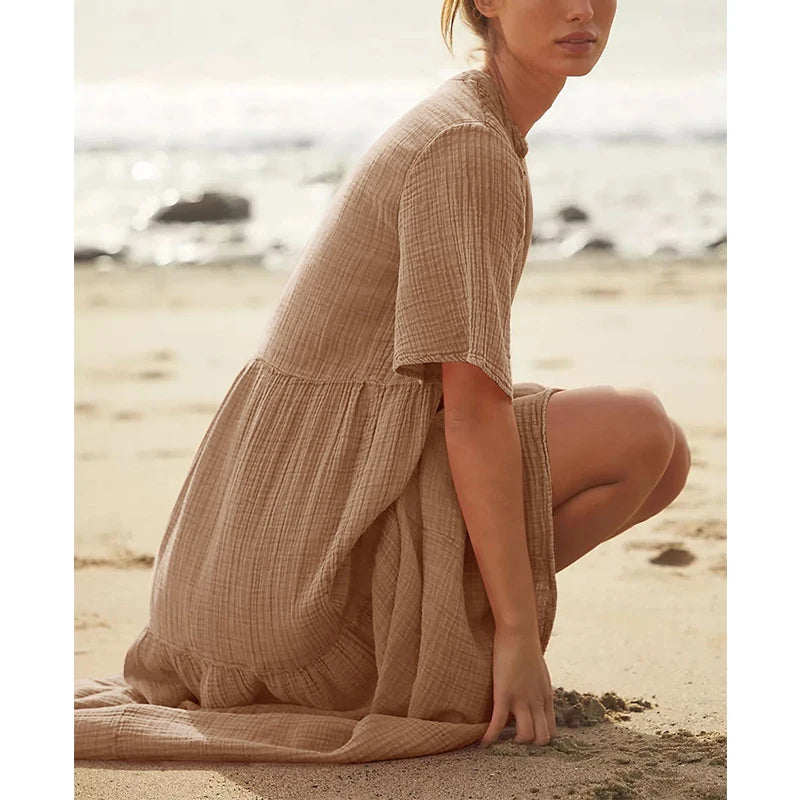 Muślinowa sukienka midi z krótkim rękawem i dekoltem V – lekka sukienka na lato