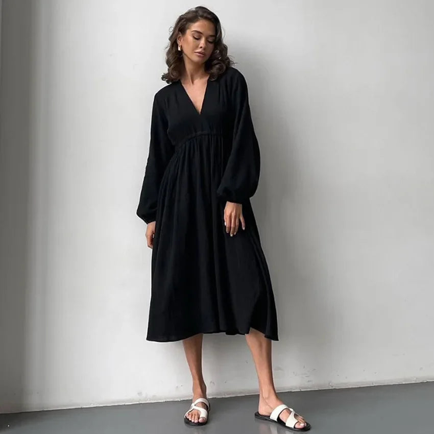 Muślinowa sukienka midi z dekoltem V i długim rękawem – luźna i przewiewna na lato