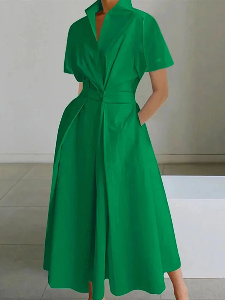 Minimalistyczna sukienka midi bez rękawów z kołnierzykiem – elegancja w nowoczesnym wydaniu