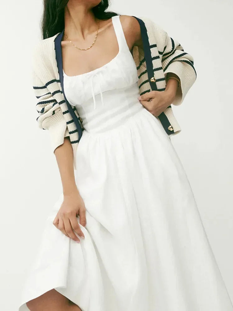 Damska lniana sukienka midi na ramiączkach