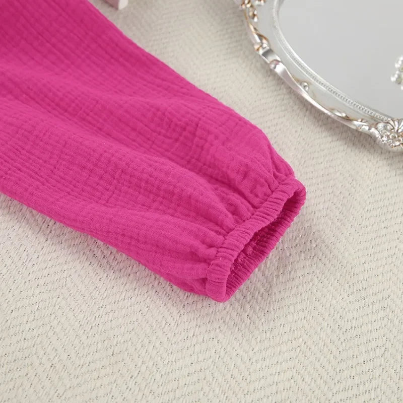 Muślinowa sukienka midi z dekoltem V i długim rękawem – luźna i przewiewna na lato