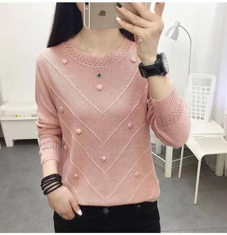 Damski sweter z ozdobnymi detalami