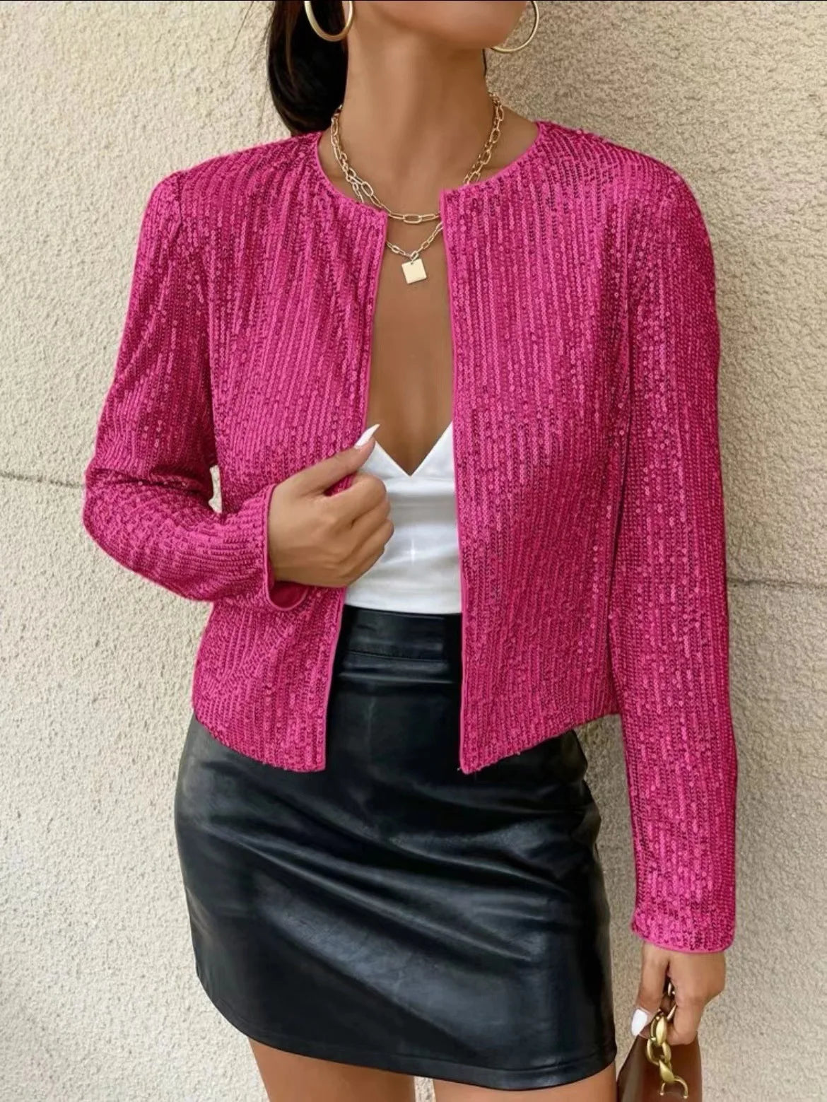 Damska marynarka z cekinami i długim rękawem