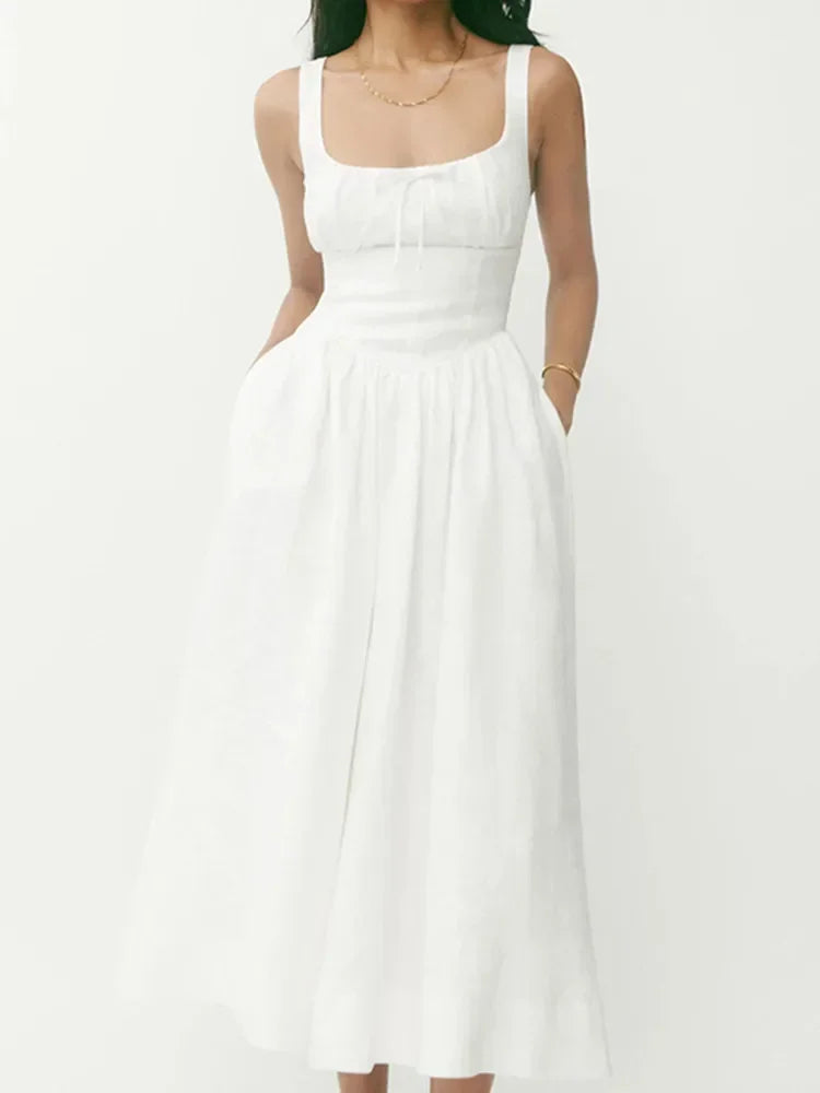 Damska lniana sukienka midi na ramiączkach