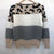 Damski sweter z wzorem w cętki