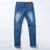 Męskie jeansy z przetarciami skinny stretch