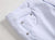 Białe jeansy męskie z przetarciami slim fit