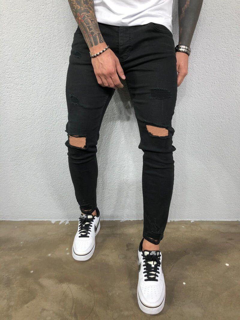 Męskie jeansy skinny fit z przetarciami i dziurami