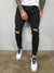 Męskie jeansy skinny fit z przetarciami i dziurami