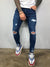 Męskie jeansy skinny fit z przetarciami i dziurami