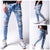 Męskie jeansy skinny fit z przetarciami, dziurami i bocznymi paskami