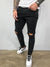Męskie jeansy skinny fit z przetarciami i dziurami