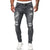 Męskie jeansy slim fit z przetarciami i dziurami
