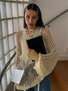 Dziurkowany sweter Seheso