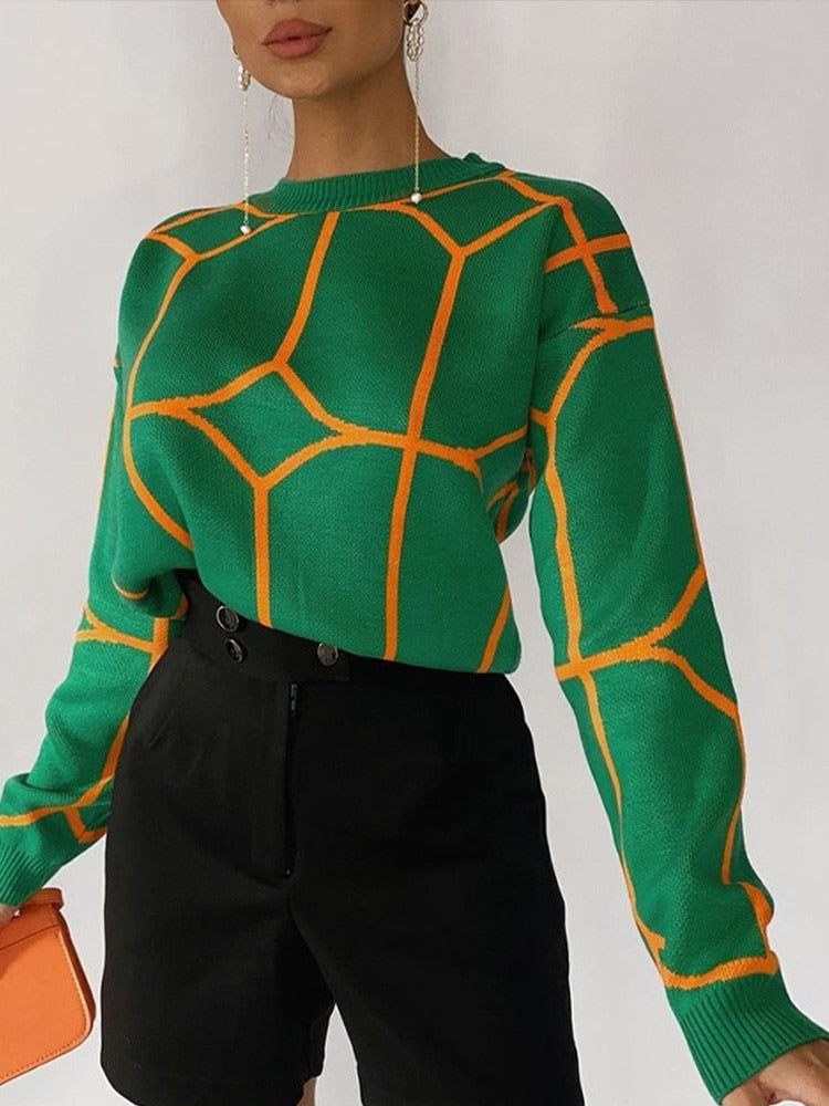 Damski sweter z geometrycznym wzorem w paski