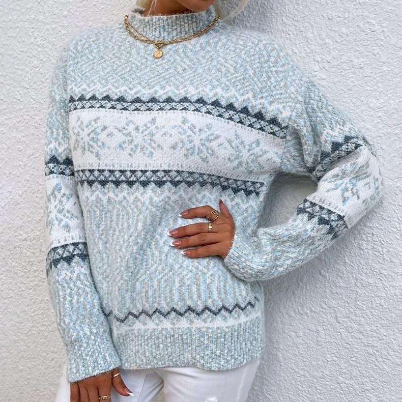 Damski sweter z motywem śnieżynek i norweskim wzorem