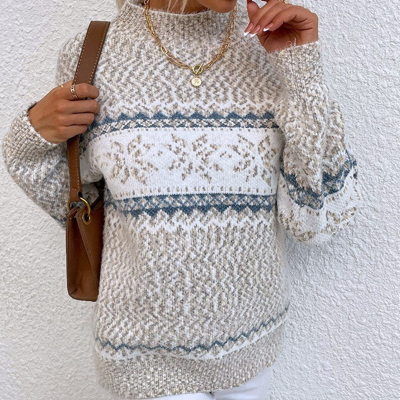 Damski sweter z motywem śnieżynek i norweskim wzorem